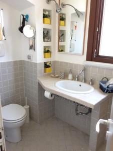Koupelna v ubytování B&B Bolina + 11 fotografií
