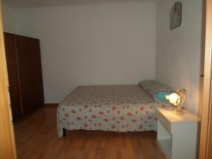A bed or beds in a room at Villa Martina nel Salento