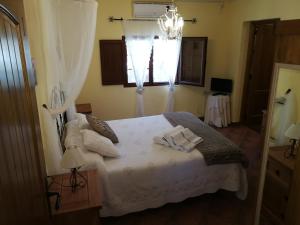 Posteľ alebo postele v izbe v ubytovaní Casa Rural Balcón del Camino Viejo