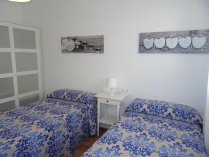 Cama o camas de una habitación en Carmen Apartamentos