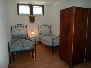 A bed or beds in a room at Villa Martina nel Salento