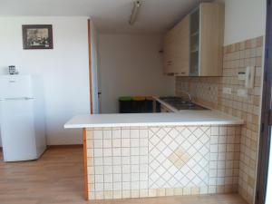 A kitchen or kitchenette at Villa Martina nel Salento