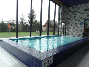 Bazén v ubytovaní Apartament z widokiem na morze - Apartament Turkusowy alebo v jeho blízkosti