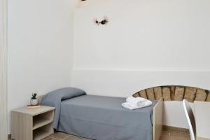 Postel nebo postele na pokoji v ubytování B&B Santa Lucia, Rapolla