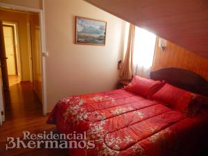 Postel nebo postele na pokoji v ubytování Residencial Tres Hermanos