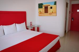 Posteľ alebo postele v izbe v ubytovaní Hotel Zar La Paz