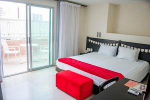 Postel nebo postele na pokoji v ubytování Hotel Suite Continental