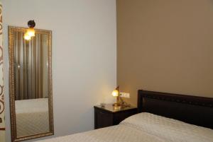 A bed or beds in a room at Hotel Filoxenia