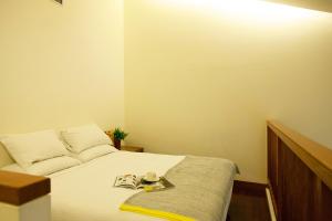Posteľ alebo postele v izbe v ubytovaní Luminous Hot Spring Resort & SPA