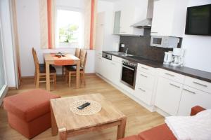 Kuchyň nebo kuchyňský kout v ubytování Appartements Dullnig + 10 fotografií