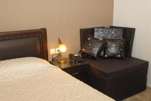 A bed or beds in a room at Hotel Filoxenia