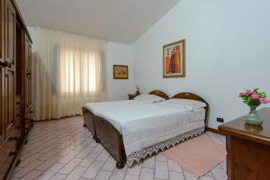 Posteľ alebo postele v izbe v ubytovaní B&B Li Fringi + 33 fotografií