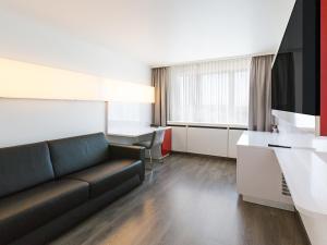 אזור ישיבה ב-DORMERO Hotel Stuttgart