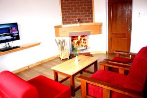 TV a/nebo společenská místnost v ubytování Altius Nest Hotel
