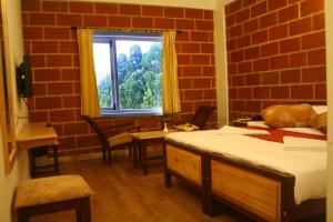 Postel nebo postele na pokoji v ubytování Altius Nest Hotel