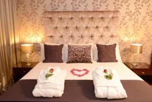 Katil atau katil-katil dalam bilik di McGettigans Hotel