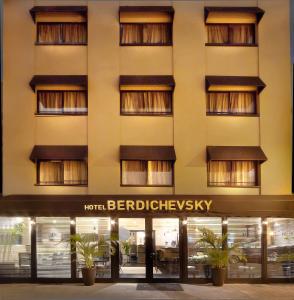 a building with a sign on the side of it at Hotel B Berdichevsky in Tel Aviv