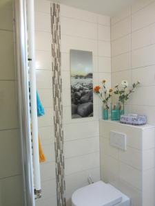 Ένα μπάνιο στο Ferienwohnung Seepferdchen
