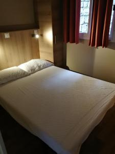 Letto o letti in una camera di Camping Fossa Lupara