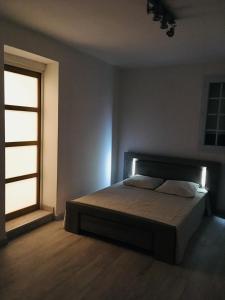 Ένα ή περισσότερα κρεβάτια σε δωμάτιο στο villa rinesa