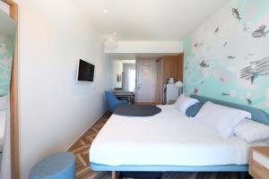 Кровать или кровати в номере Mar Azul Pur Estil Hotel & Spa