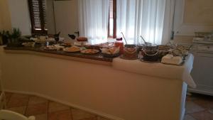 A restaurant or other place to eat at Albergo Delle Fonti