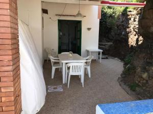Patio alebo iná vonkajšia časť ubytovania Case del Tramonto