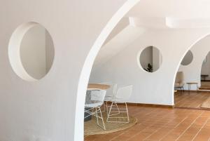 A seating area at Hotel Es Blau Des Nord