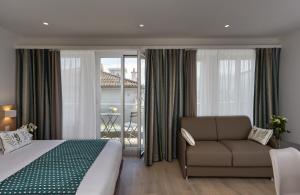 Cama ou camas em um quarto em Hotel Suisse