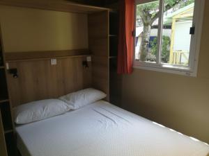 Letto o letti in una camera di Camping Fossa Lupara