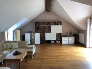 a living room with a couch and a table at Ferienhaus Werkhof in Schönau