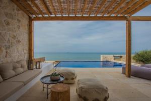 The swimming pool at or close to Niova Villa - Seafront, private pool and Ionian Sea Views, by ZanteWize