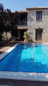 Bazén v ubytovaní Castello Bellos Villas alebo v jeho blízkosti