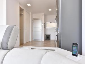 Postel nebo postele na pokoji v ubytování Penthouse Beyond Amadores