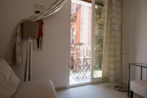 En eller flere senge i et værelse på The light house "Al centro"