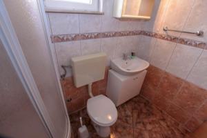 Koupelna v ubytování Apartments Mira