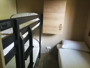 Letto o letti in una camera di Camping Fossa Lupara