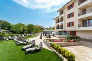 Zahrada ubytování Villa Aria 1