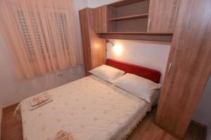 Postel nebo postele na pokoji v ubytování Apartments Mira