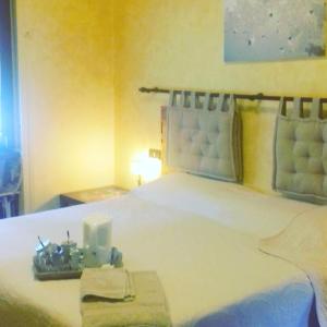 Postel nebo postele na pokoji v ubytování Bed & Breakfast A San Siro 75