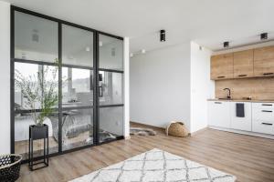 Kuchyňa alebo kuchynka v ubytovaní udanypobyt Smrekova Apartament + 8 fotografií