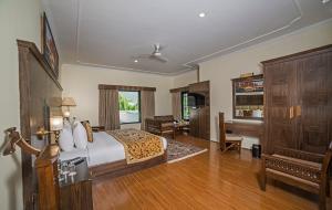 Voodi või voodid majutusasutuse Lemon Tree Hotel Srinagar toas