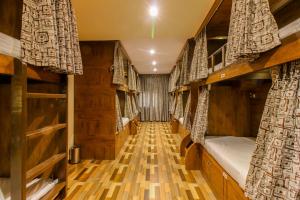 Postel nebo postele na pokoji v ubytování Blossom Dormitory For Male and Female