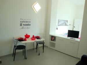 TV a/nebo společenská místnost v ubytování Iride Guest House