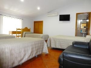 
Cama o camas de una habitación en Hostal San Miguel
