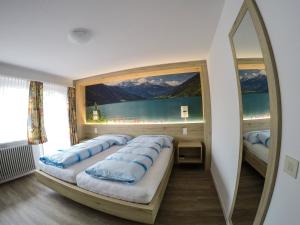 Voodi või voodid majutusasutuse Hotel Posta toas