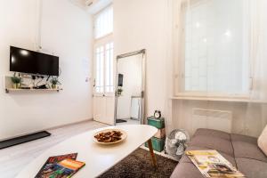 Televízia a/alebo spoločenská miestnosť v ubytovaní BpR Little Attractico Apartment