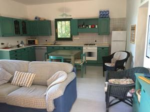 Кухня или мини-кухня в Casa La Pelosa Beach
