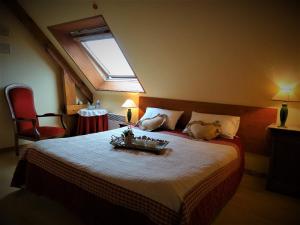 Una cama o camas en una habitación de Chambres d'Hôtes Le Clos Vaucelle