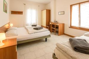 Katil atau katil-katil dalam bilik di Villa Nirvana
